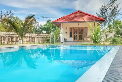 Image de Komfortables Doppelzimmer mit Pool, Wifi und Kühlschrank mit Strandzugang