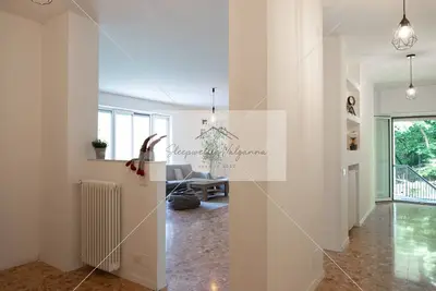 Image de Spacious and bright apartment surrounded by greenery 10 minutes from Varese