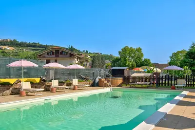 Image de Appartement de vacances 'Magnolia' dans le Piémont, avec piscine commune, jardin et sauna