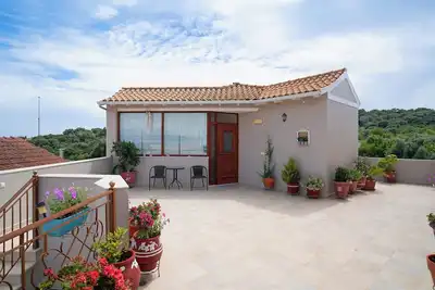 Image de Appartement \"Lakis\" avec vue sur la mer, jardin, terrasse et Wi-Fi.