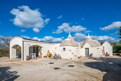 Image de Maison de vacances \"La Valle dei Trulli\" avec jardin privé, bain à remous & Wi-Fi
