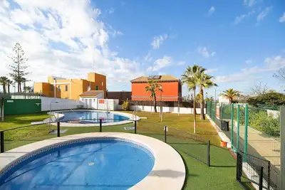 Image de Appartement \"Terrazas de Doñana B7be\" près de la plage avec piscine partagée et Wi-Fi