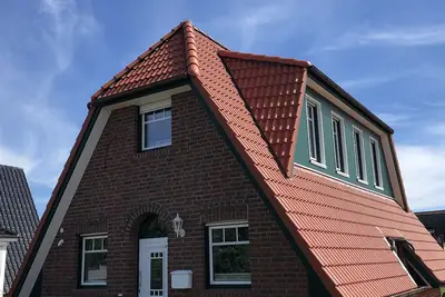 Image de Ferienhaus Bootsmann
