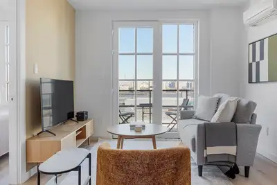 Image de Amazing Dumbo 2br w/ W/D, Roof & Gym, nr TimeOut Building, by Blueground