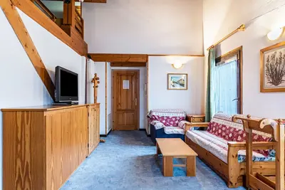 Appartement \"Casa Martini\" avec vue sur les montagnes, balcon et Wi-Fi.