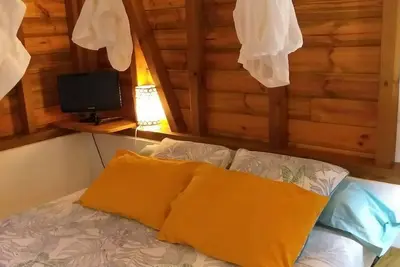 Image de Bungalow tout équipé avec cuisine extérieure, climatisation, salle de bain douche italienne