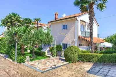 Image de Appartement de vacances avec jardin et Wifi