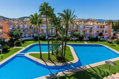 Image de Arenal Park Ii Apartment Javea Arenal, avec terrasses, Ac et espaces communs avec grande piscine, jardin, tennis, paddle