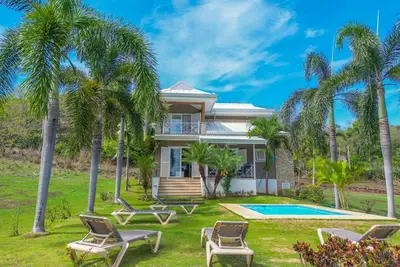Image de Puerta Playa Tamarindo - 3 bedroom secluded house with private pool