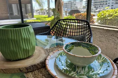 Image de Enjoy sunny water views from your private lanai. Steps to Madeira Beach.