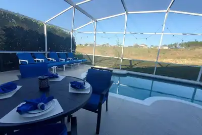 Image de ✨Bright & Spacious 4‑Bedroom Villa with Private Heated Pool—Minutes from Disney!