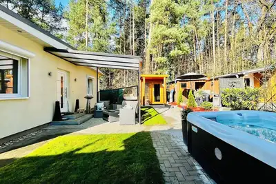 Image de 4 Sterneferienhaus Direkt am Wald, Nahe Potsdam & Berlin