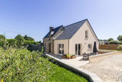 Image de Maison moderne avec jardin clos, proche de la mer et des commodités, idéale pour familles, à Saint-Pierre-Église