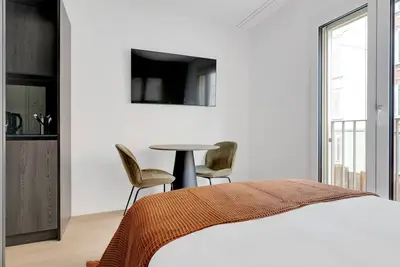 Image de Airy Wiedikon 1. 5 Room w\/ Storage & W\/D, 1 min to Market, by Blueground
