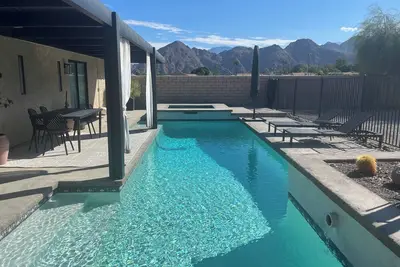 Renovated Pool House with Golf Course & Mountain Views & Spa-like Masterbath.