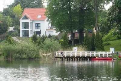 Image de Holiday home with 160sqm, right on the lake - with sauna