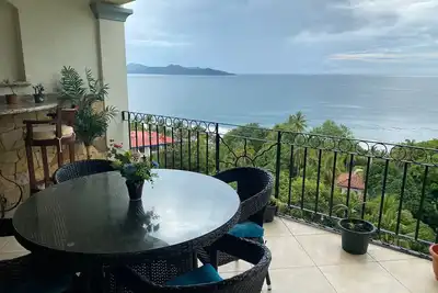 Image de Flamingo Beach condo, roll down hill to the best beach we have found!