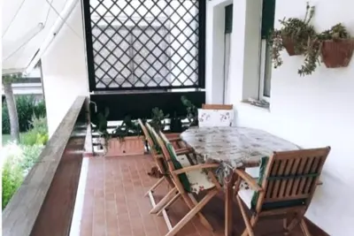 Image de Appartamento con Piscina