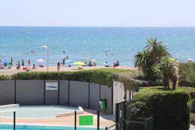 Image de Appartement front de mer, climatisé, traversant, piscine privative, parking