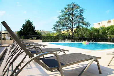 Image de Offre été! Près Plage | Apt Premium Accès Piscine
