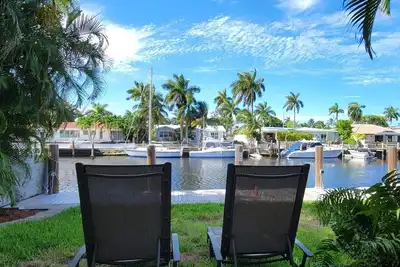Image de Water front condo with pool. Beautiful view. Walk to the beach.