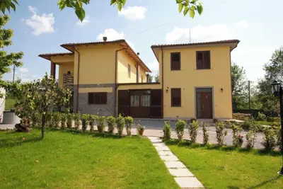 Image de Appartement \"Papà Giuseppe La Colombaia\" avec piscine partagée et Wi-Fi
