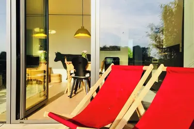 Image de Architektur trifft Seenähe. Wohlfühlunterkunft mit Blick in die Natur und Berge.