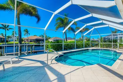 Image de Villa Four Palms – Heated Pool | Gulf Access | Canal View | Boat Rental + Tours Voucher Incl.