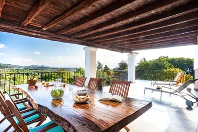 Image de Can Macia, villa à Santa Eulalia avec vue imprenable sur la mer et levers de soleil