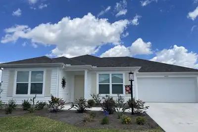 Image de Charming 3/2 in village of DeLuna with golf cart. Inquire about Summer discount.