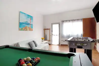 Image de Maison de vacances \"El Faro Sardina\" avec vue sur la mer, terrasse et Wi-Fi.