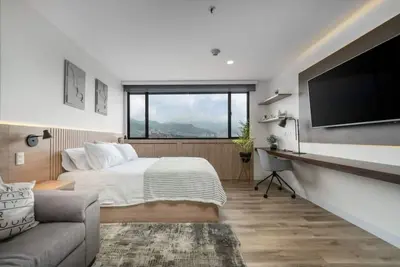 Image de Go Living 1015 · Cozy Loft apt, kitchenette and Ac with coworking