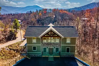 Image de Indoor pool, hot tub, game room, all en suite bedrooms, and mountain views.