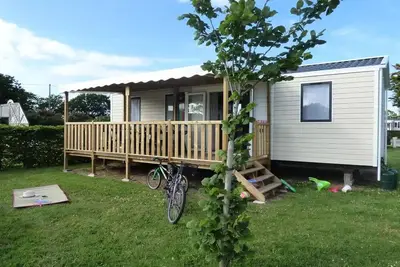 Image de Mobilhome Family Premium 36m² - 4 chambres \/ terrasse couverte + Tv + Lv + Draps 8 personnes