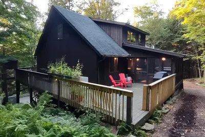 Image de Upper Saranac Lake. Beach/dock/boat ramp. King bed, pets, paddle, hike, Ski!