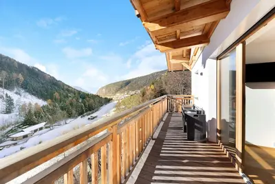 Image de Töniglerhof \"Appartement Abendrot\" avec vue sur les montagnes, jardin et Wi-Fi.