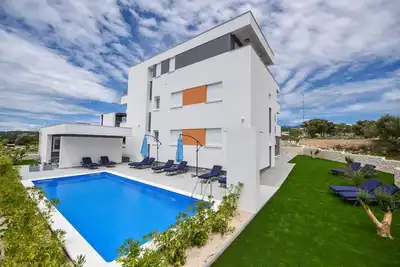 Image de Appartement de vacances Novalja pour 1 - 8 personnes avec 3 chambres à coucher - Maison de vacances