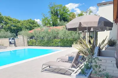 Image de Casa Pergola 1 - Elegant apartment for 6 people- swimming pool and parking space