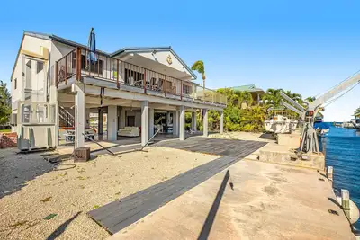 Image de Renovated waterfront duplex with canal access, covered patio, deck, & central Ac