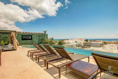 Image de Rooftop Infinity Pool Condo, Gym, Near Coco Beach