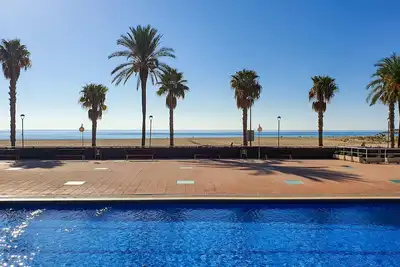 Image de Appartement bord de mer à Torredembarra avec 4 piscines, jardin et parking privé