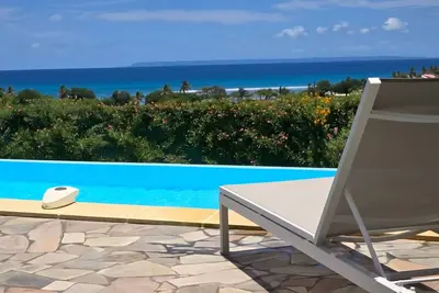 Image de Topaz beach: Villa De Standing vue panoramique face mer & plage piscine privée