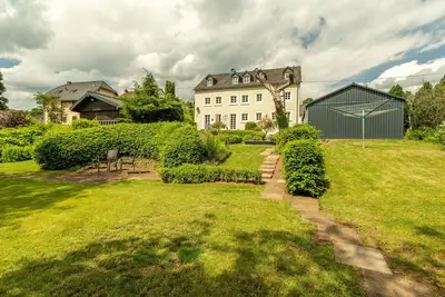 Image de Appartement \"Happynest\" avec vue sur la montagne et le jardin et Wlan