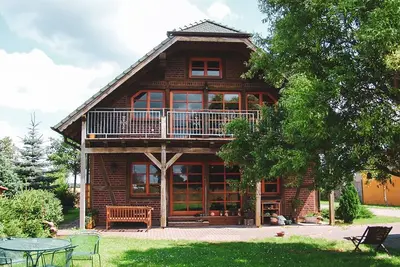 Image de Appartement de vacances \"Landhaus Charlotte - Storchennest\" avec vue sur le lac, balcon et Wi-Fi