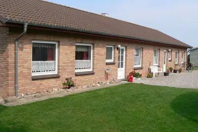 Image de Maison de vacances \"Whg 4 - Ferien auf einem Resthof\" avec vue sur mer, jardin et Wi-Fi.