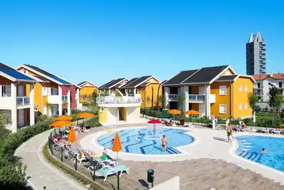 Image de Bel appartement pour 7 personnes avec Wifi, piscine, climatisation, Tv, terrasse et parking