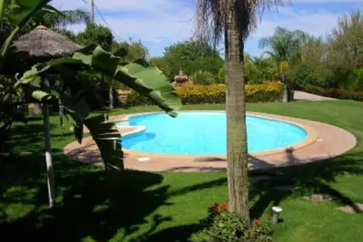 Image de With pool, garden, barbecue and lake