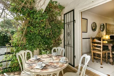 Image de Maison de vacances \"Villa Montgó Parc con Piscina\" avec jardin, terrasse et piscine partagée.
