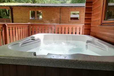 Image de Log cabin with hot tub and  nestled in Kenwick Park, Louth