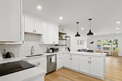 Updated Craftsman home with open floor plan in great Seattle location